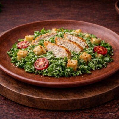 Салат Цезарь с курицей в Оджах по цене 590 ₽