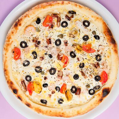 Пицца с морепродуктамив Dark Lava по цене 939 ₽