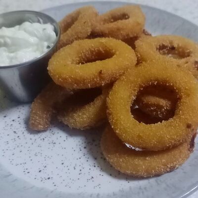 Луковые кольца с соусом тартар в Оазис кафе по цене 390 ₽