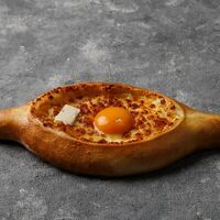 Хачапури по-аджарски в Кафе Мимино