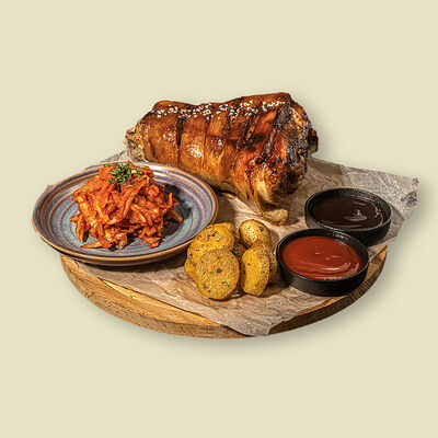 Рулька подкопчённая с картофелем и капустой в Додома по цене 2885 ₽