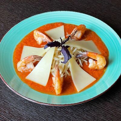 Дунганская лапша с креветкми в Навруз по цене 690 ₽