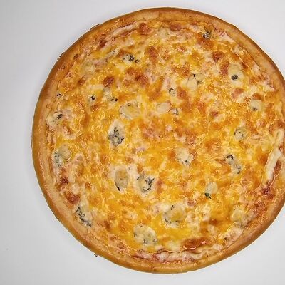 Пицца Четыре Сыра в Pizza mizza по цене 419 ₽