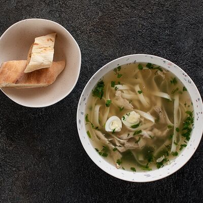 Куриный суп с лапшой в Tsomi по цене 470 ₽