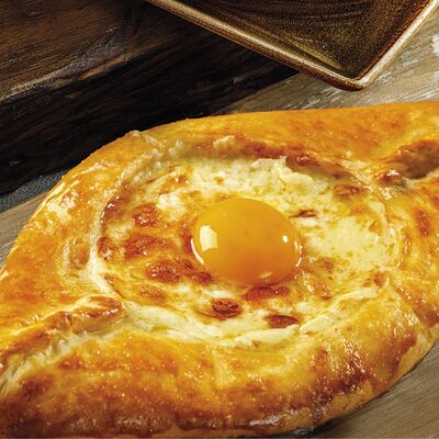 Хачапури по-аджарски в Урюк по цене 630 ₽