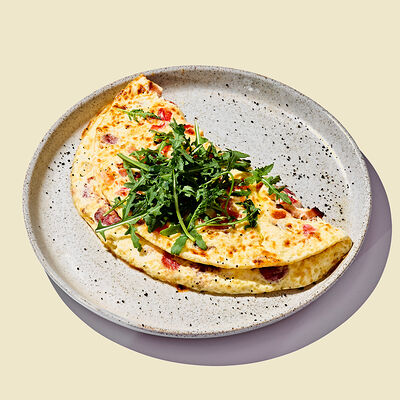 Омлет с беконом и томатами в Римляне по цене 480 ₽