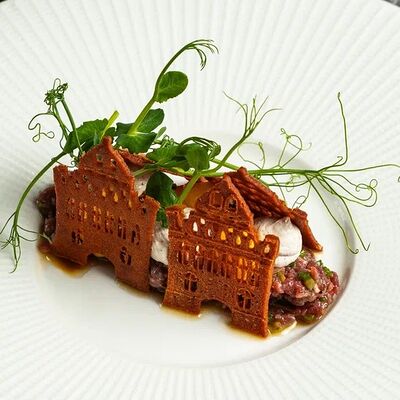 Фирменный тартар из мраморной говядины в Dodici Grill по цене 1280 ₽