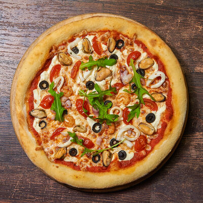 Пицца с морепродуктами в Secret pizza lab по цене 480 ₽