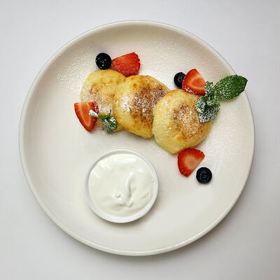 Сырники со сметаной в Атмосфера по цене 500 ₽