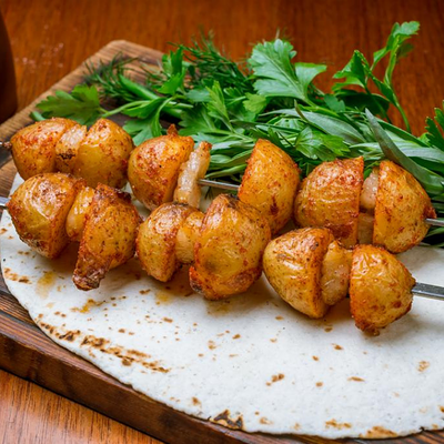 Шашлык картофель с курдюком в Мангал по цене 400 ₽