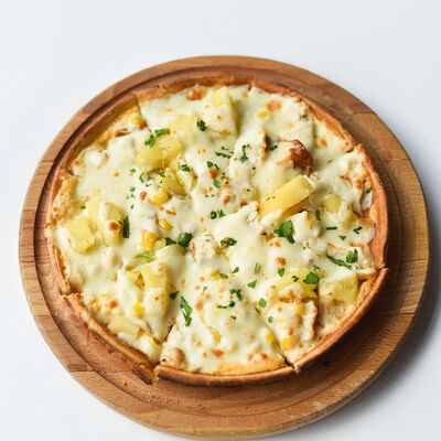 Пицца с курицей и ананасами в Pizza Club по цене 415 ₽
