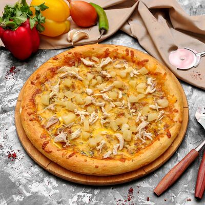 Пицца Курица с ананасами в Вкусное место по цене 450 ₽