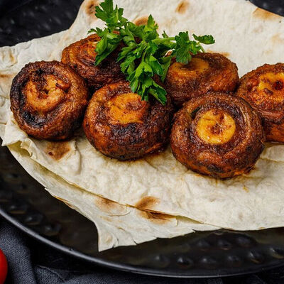 Шампиньоны на мангале в Мангал холл по цене 660 ₽