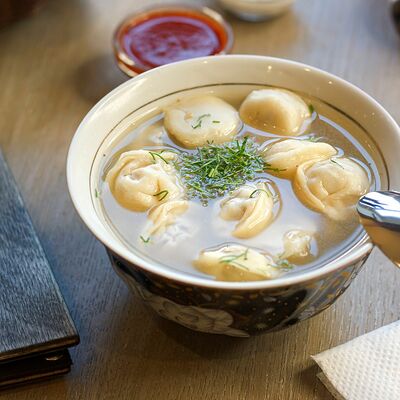 Пельмени с бульоном в Учкудук по цене 470 ₽