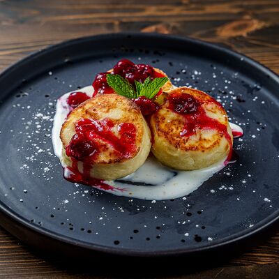 Сырники с топпингом в Гастробар Феллини по цене 450 ₽