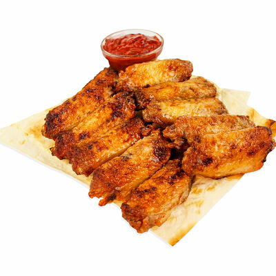 Куриные крылья на мангале в Две печи по цене 650 ₽