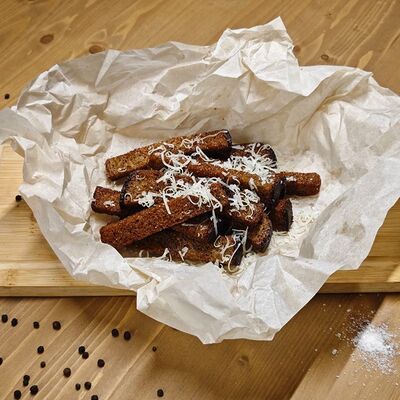 Чесночные гренки в ATLAS BY CUISINE по цене 270 ₽