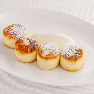 Сырники с йогуртом в Harvest по цене 650 ₽