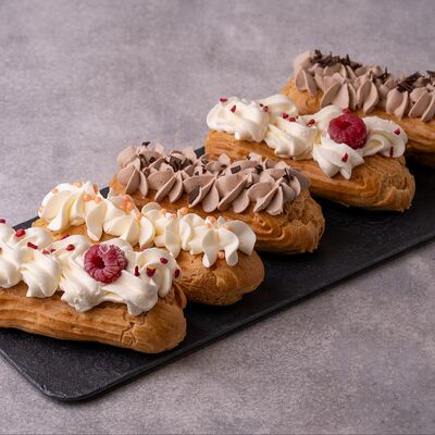Набор эклеров в Фабрика чизкейков по цене 750 ₽