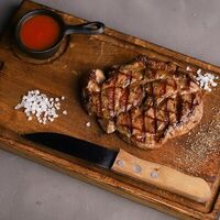 Свиная шейка в пикантном маринадев Bizon Grill Pub