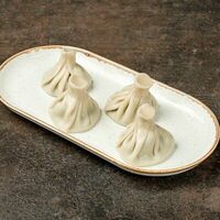 Хинкали с сыром сулугуни и свежей мятой в Лари