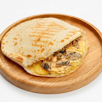 Питатос с курицей и грибами в Матрешкино по цене 350 ₽