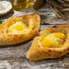 Хачапури по-аджарски (2 яичных желтка) в Пиросетия Осетинские пироги по цене 530