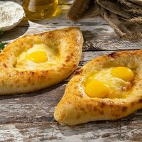 Хачапури по-аджарски (1 яичный желток) в Пиросетия Осетинские пироги