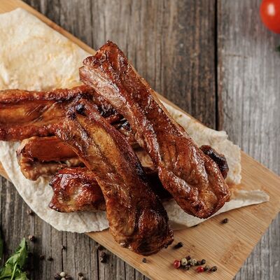 Ребра свиные на мангале в Шашлычная Сытый Лис по цене 380 ₽