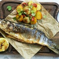 Сибас жаренный на гриле с молодым картофелем в Остерия Il Massimo