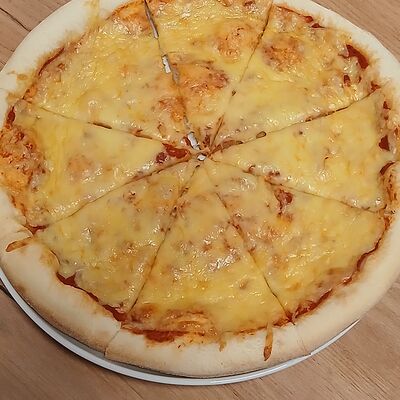 Пицца сырная Халяль в Uz кафе по цене 650 ₽