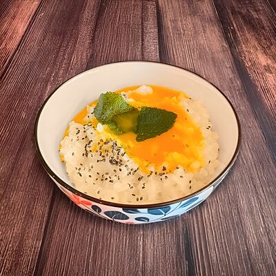 Каша рисовая на кокосовом молоке с соусом Манго в Kekou Вкусная еда по цене 230 ₽