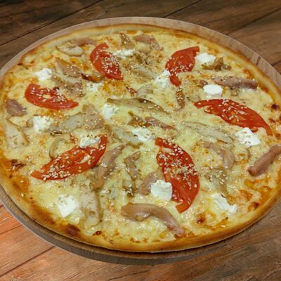 Пицца Индейка фирменная в Мате по цене 700 ₽