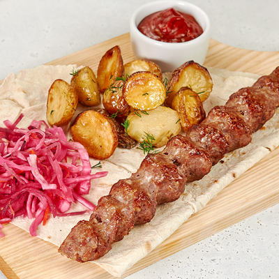 Люля из говядины с картофелем беби и капустой по-Грузински упак. Д в Bazar по цене 399 ₽