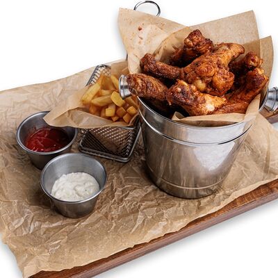 Ведро куриных крыльев в PINTA Bar & Grill по цене 15590 ₸