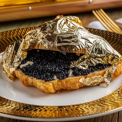 Круассан золотой в Christian по цене 6000 ₽