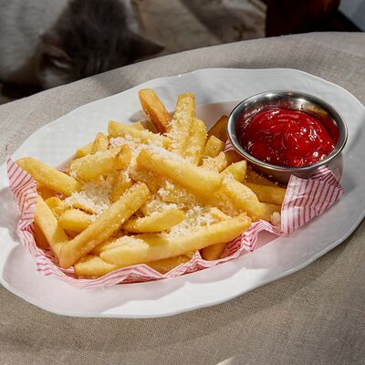 Картофель фри с пармезаномв Гостиная по цене 450 ₽
