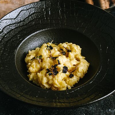 Толченый картофель со сливочным маслом в Мамонт по цене 210 ₽