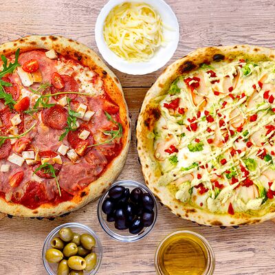 Две пиццы в Томат по цене 1655 ₽