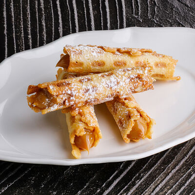 Вафельные трубочки со сгущенкой в Ginza по цене 490 ₽