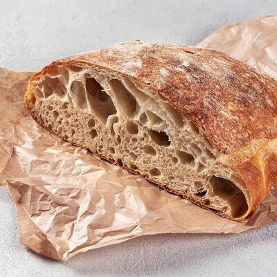 Пшеничный хлеб Перле (четверть) в Кофемания по цене 490 ₽