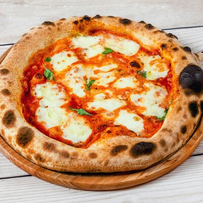 Пицца Маргарита в VINO e CUCINA по цене 690 ₽