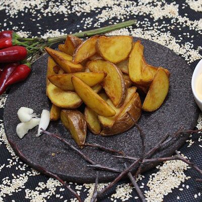 Картофель по-деревенски в Много пиццы по цене 195 ₽