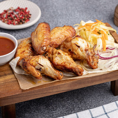 Куриные крылышки на углях в Чыраг Гала по цене 460 ₽