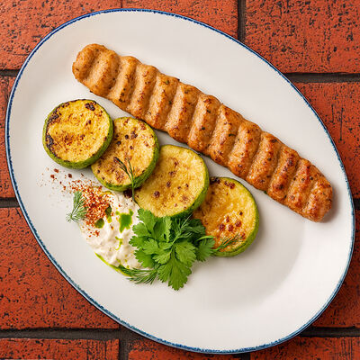 Кебаб из лосося с цукини на мангале в Дзеими по цене 428 ₽