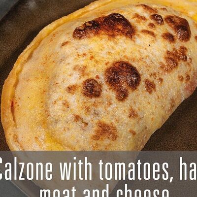 Кальцоне с томатами, ветчиной, мясом и сыром в Рестобар Гриль 39 по цене 650 ₽