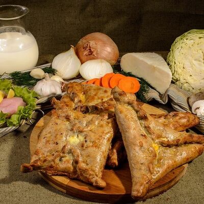 Чукуры с картошкой и зеленью в Пироги по-коми по цене 946 ₽
