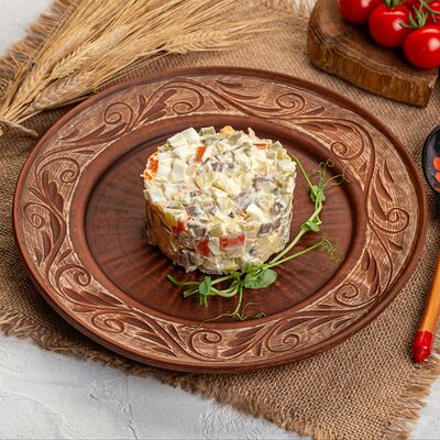 Салат Оливье с языком в Русская кухня по цене 580 ₽