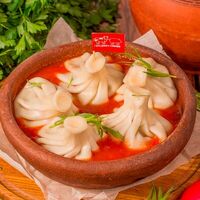 Хинкали со свининой и говядиной в томатном соусе с тархуном в Мушмула