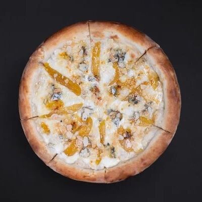 Карамелизированная груша с горгонзолой в Roof Panorama Cafe по цене 680 ₽